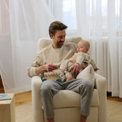 Como Rocking and Swivel Armchair - White Faux Sheepskin / Steel