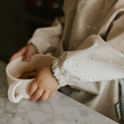 Long-sleeved Bib with integrated pocket 6-24m -Dogs