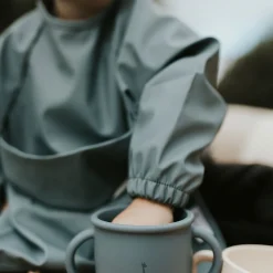 Long-sleeved Bib with integrated pocket 6-24m - Sage