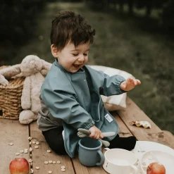 Long-sleeved Bib with integrated pocket 6-24m - Sage